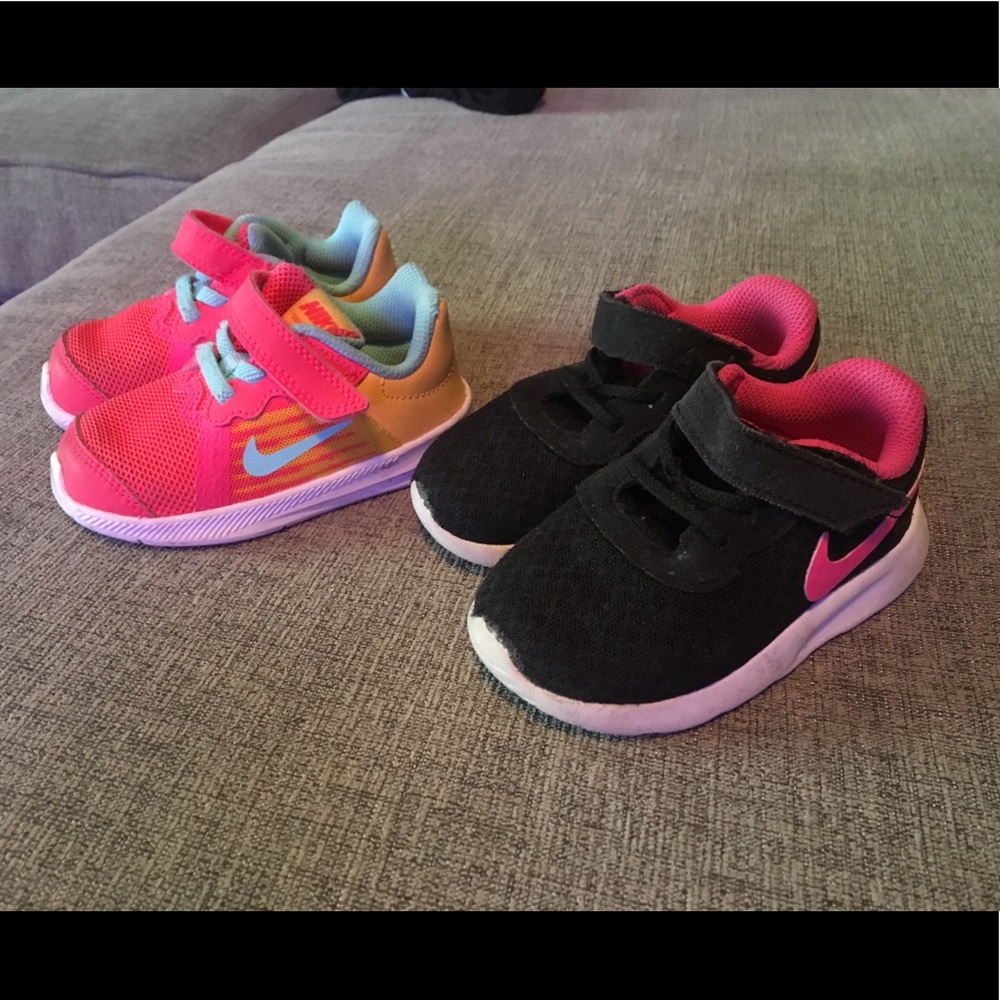 Size 6 toddler Nike sneakers.  Two pairs